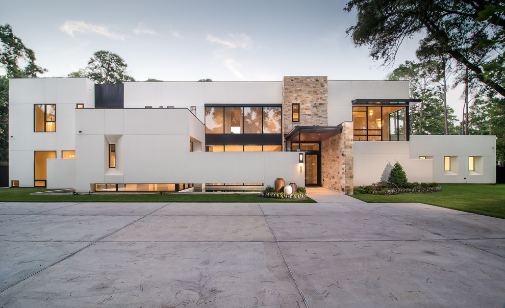 Стильный дизайн: двухэтажный, белый дом в стиле модернизм с плоской крышей - последний тренд
