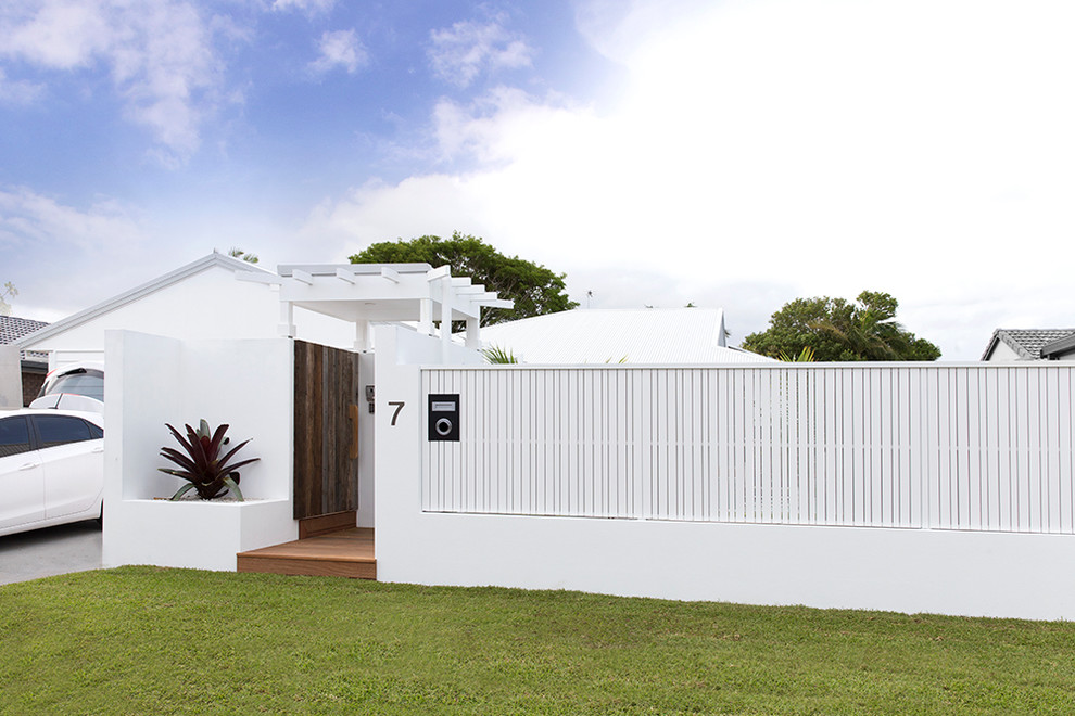 Example of a beach style exterior home design in Brisbane