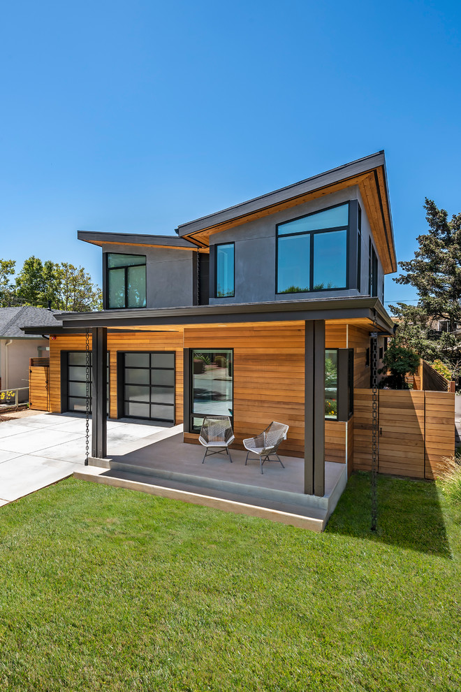 Inspiration for a mid-sized modern two-story mixed siding house exterior remodel in San Francisco