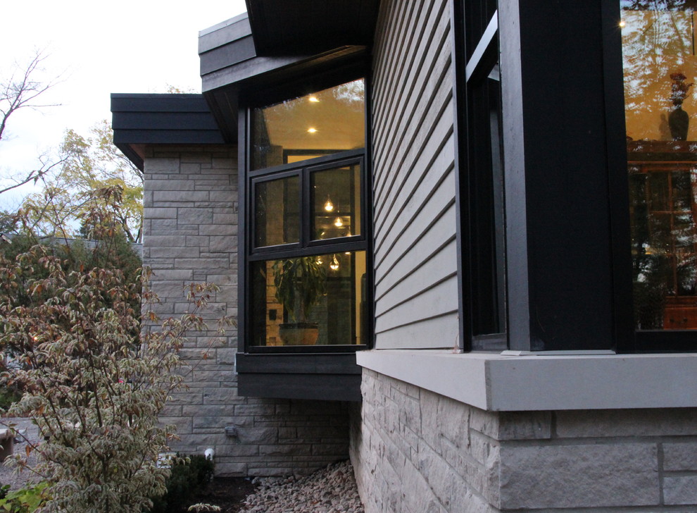 Inspiration for a contemporary house exterior in Burlington.