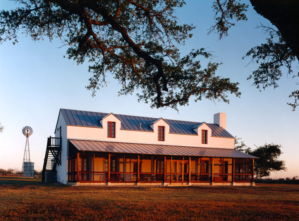 This is an example of a farmhouse house exterior in Austin.