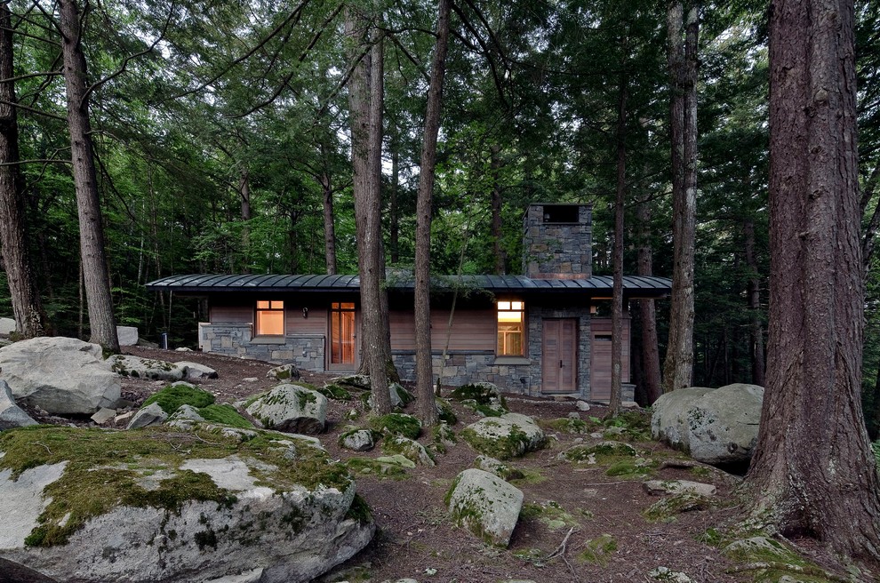 Contemporary bungalow house exterior in Portland Maine with wood cladding.