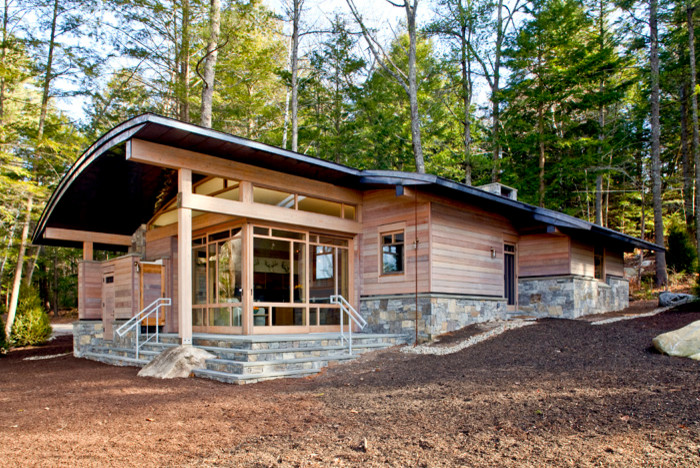 Design ideas for a contemporary house exterior in Portland Maine.