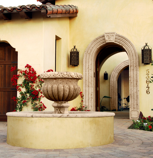 Cantera Stone Bowl Fountain and Arch Surrounds House Exterior