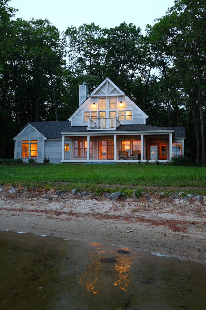 Mid-sized trendy gray two-story concrete fiberboard exterior home photo in Portland Maine with a shingle roof