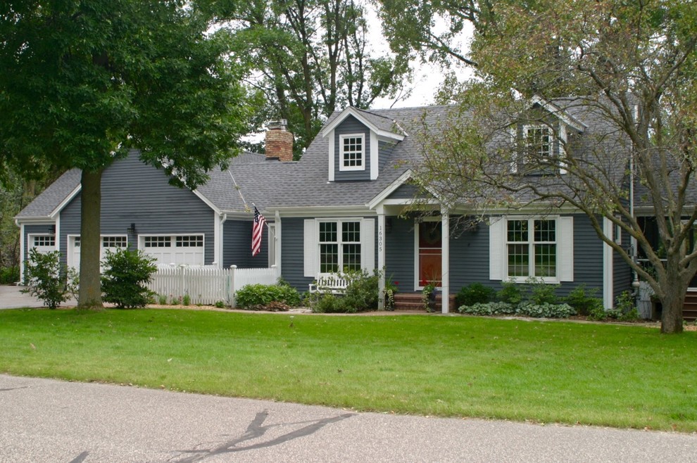Mid-sized traditional gray two-story wood gable roof idea in Minneapolis