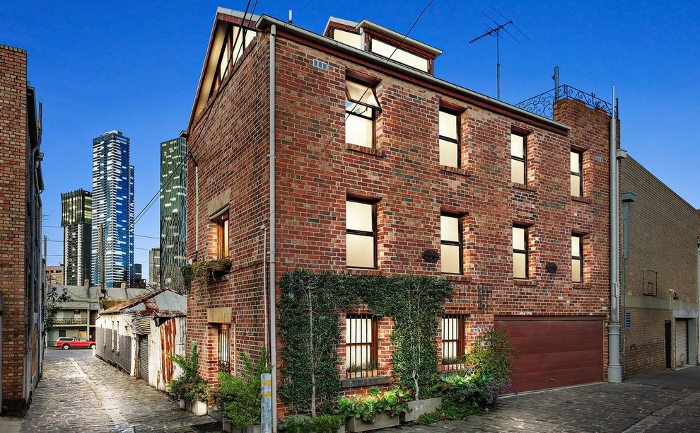 Example of a transitional exterior home design in Melbourne