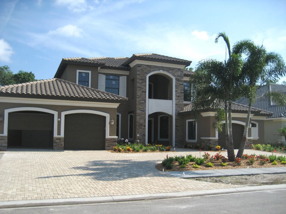 Mediterranean exterior home idea in Tampa