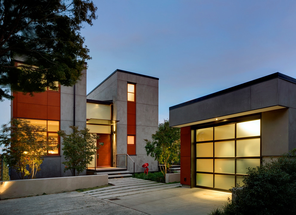 Источник вдохновения для домашнего уюта: двухэтажный, серый дом среднего размера в современном стиле с облицовкой из бетона и плоской крышей