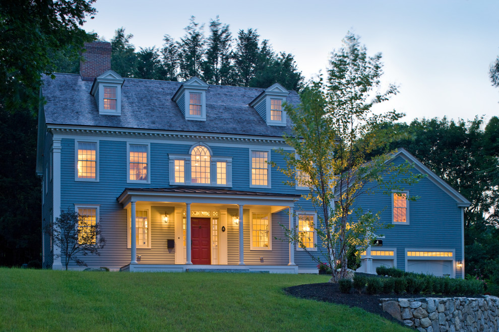Inspiration for a timeless gray two-story exterior home remodel in Burlington