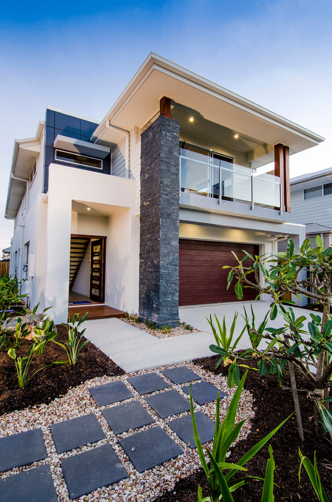 Design ideas for a white contemporary two floor brick house exterior in Brisbane.