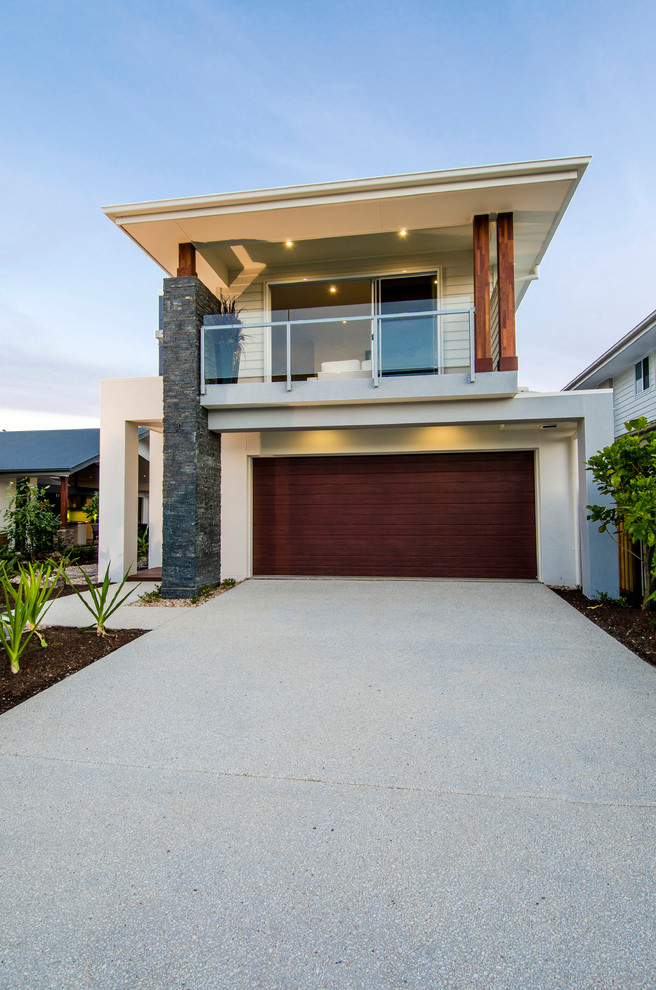 Photo of a white contemporary two floor brick house exterior in Brisbane.