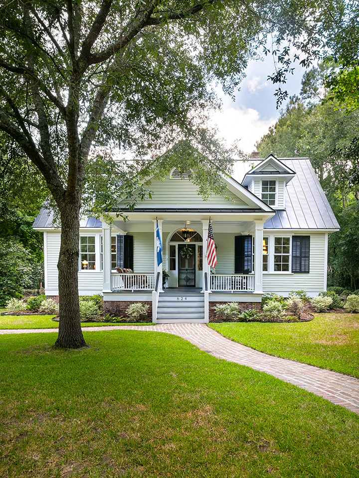 Mid-sized elegant gray two-story exterior home photo in Charleston