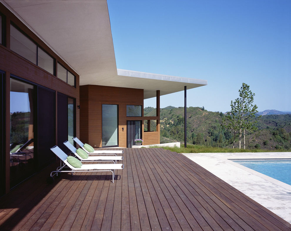 Свежая идея для дизайна: деревянный дом в стиле модернизм - отличное фото интерьера