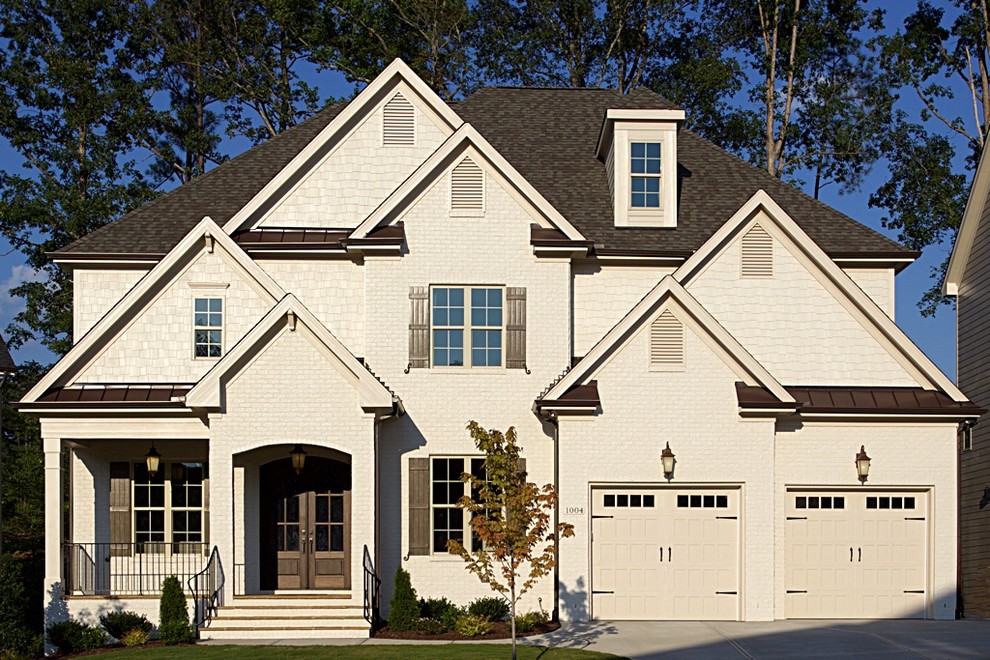 Inspiration for a large transitional exterior home remodel in Raleigh