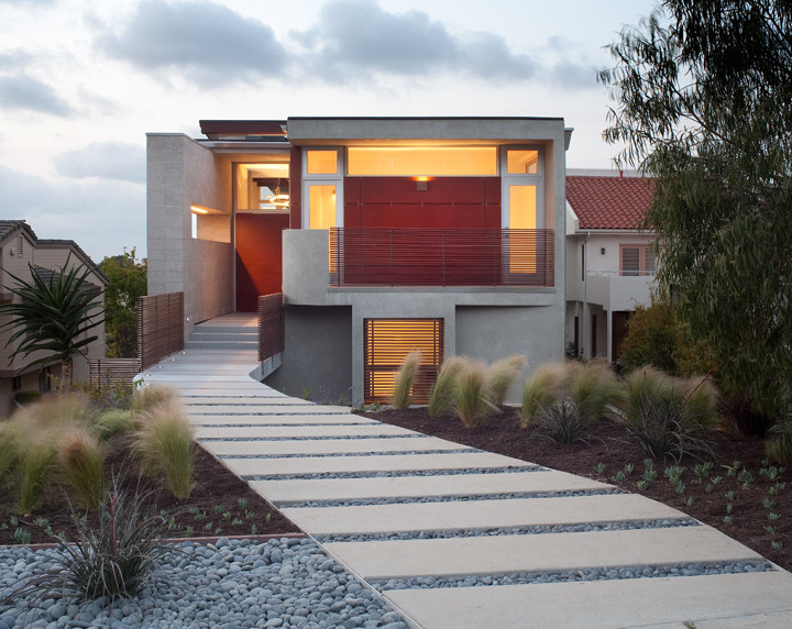 Design ideas for a large and beige contemporary two floor house exterior in San Diego.