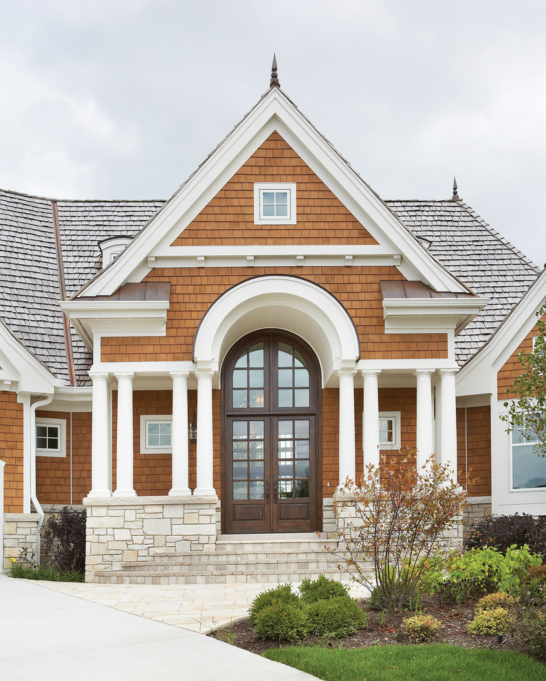 Inspiration for a timeless brown gable roof remodel in Other