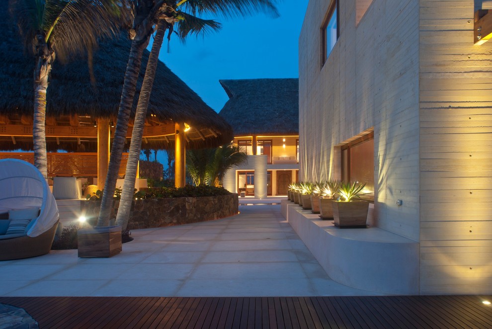 Inspiration for a tropical exterior home remodel in Other