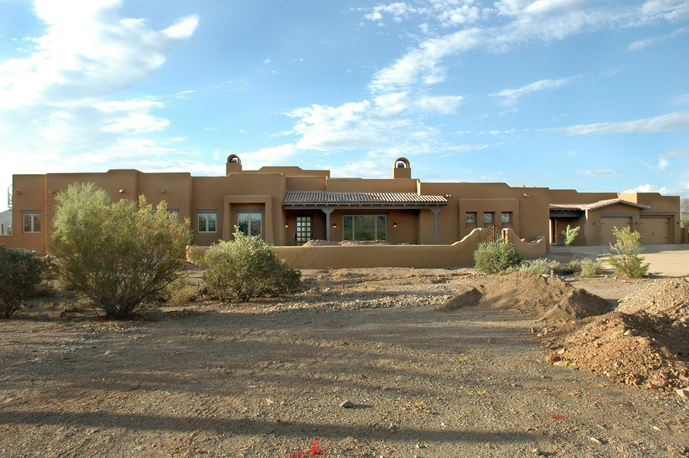 Example of a mountain style exterior home design in Phoenix