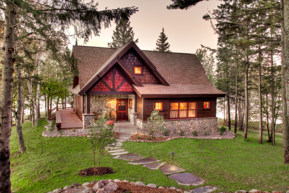 Example of a mountain style wood gable roof design in Minneapolis