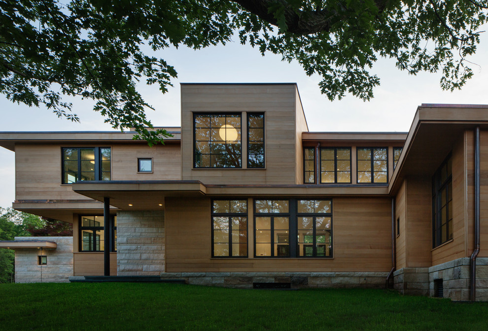 Ispirazione per la villa ampia marrone contemporanea a due piani con rivestimento in legno e tetto piano
