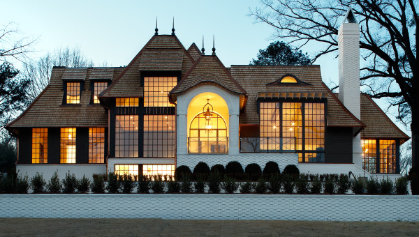 Example of a huge trendy brown two-story mixed siding house exterior design in Birmingham with a gambrel roof and a shingle roof