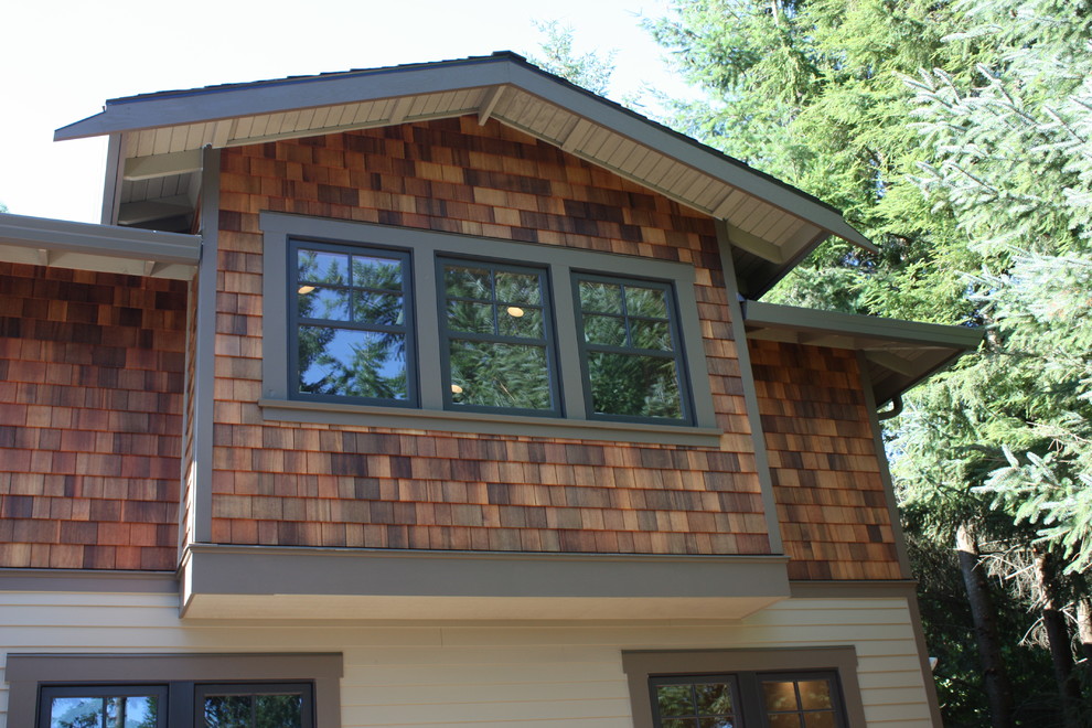 Mid-sized craftsman brown two-story wood house exterior idea in Portland