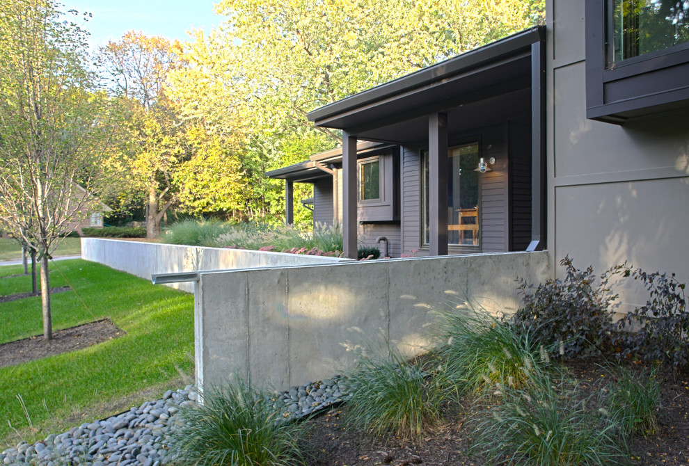 Пример оригинального дизайна: коричневый дом в современном стиле