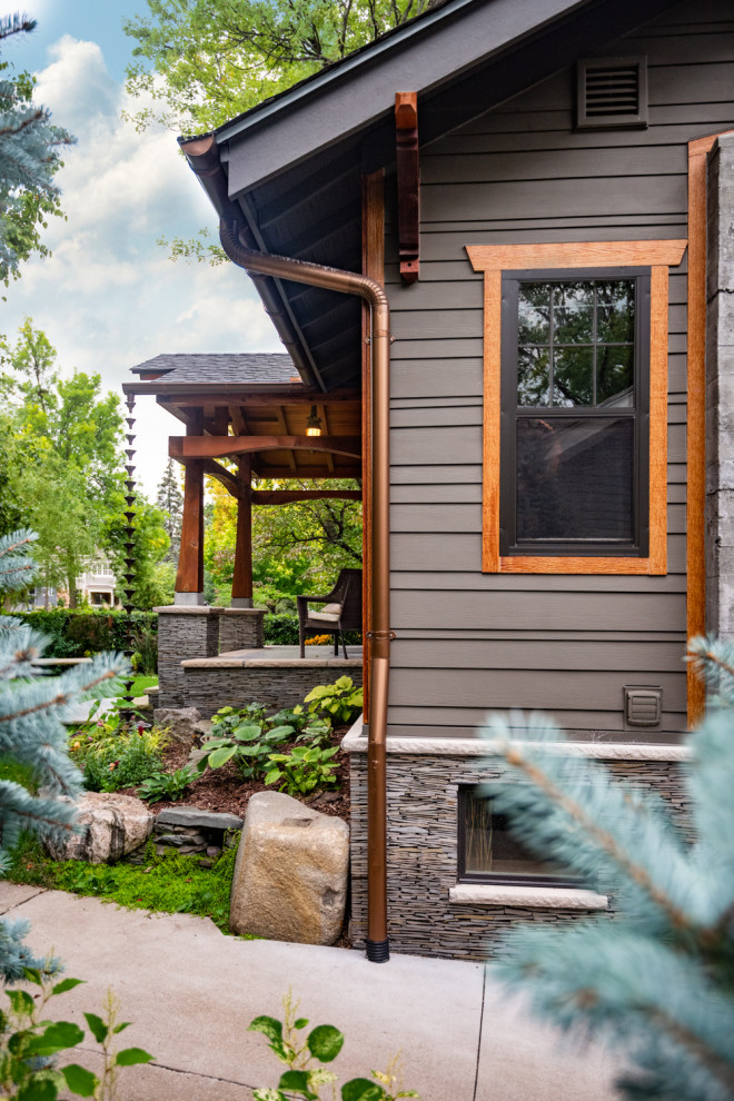 Inspiration for a craftsman gray concrete fiberboard exterior home remodel in Minneapolis