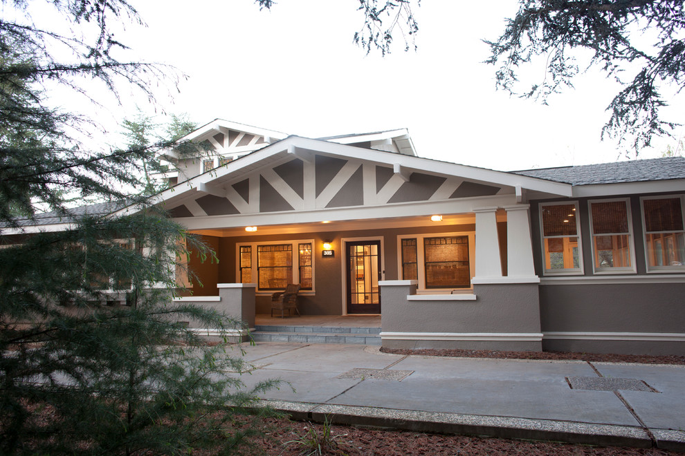 Large craftsman gray two-story stucco exterior home idea in San Francisco with a shingle roof
