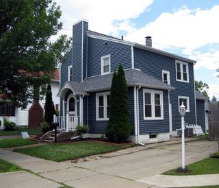 Pacific Blue Vinyl siding by CertainTeed. We like BOLD white trim and no  black shutters.