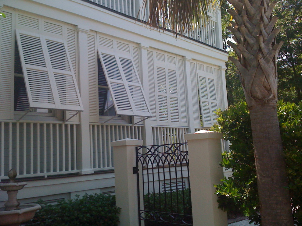Example of a tuscan exterior home design in Charleston