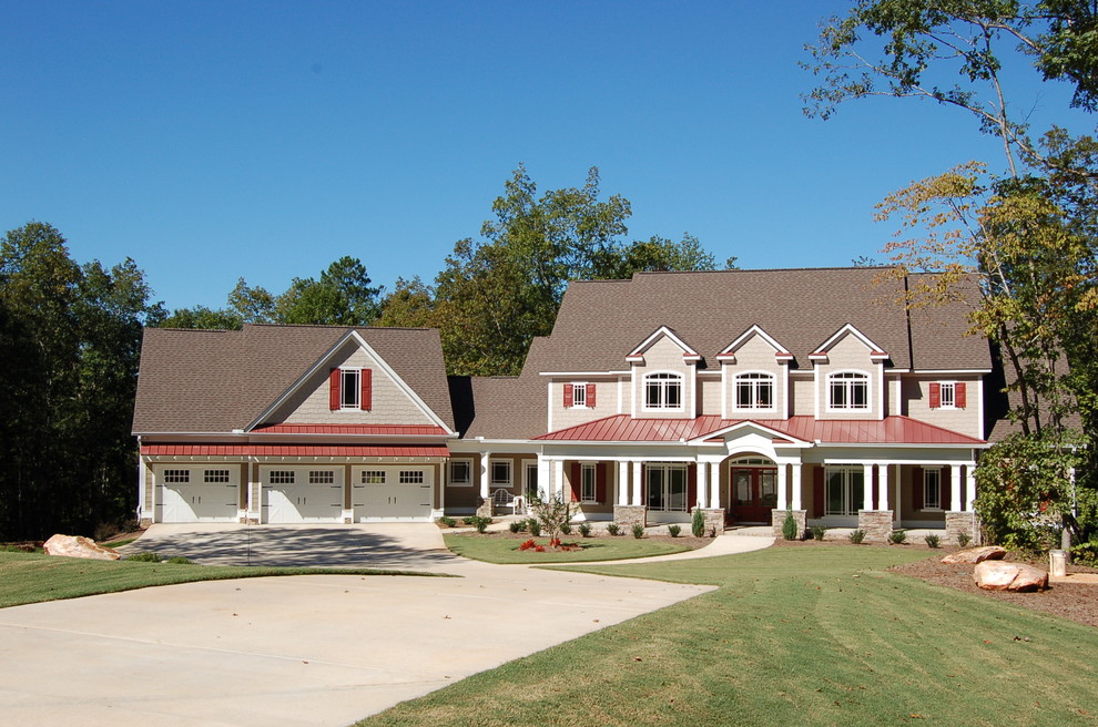 Example of a classic two-story exterior home design in Atlanta with a mixed material roof