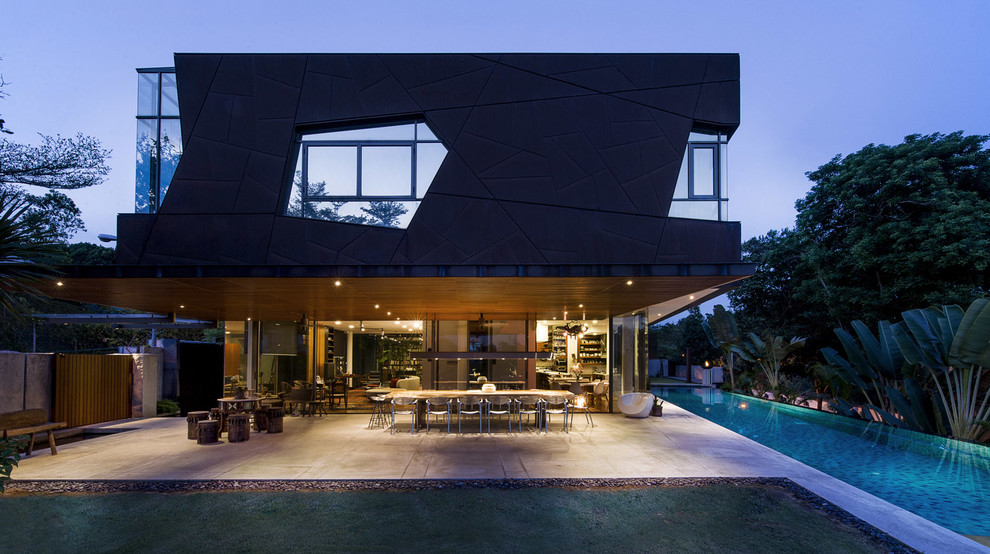 Inspiration for a world-inspired house exterior in Singapore.