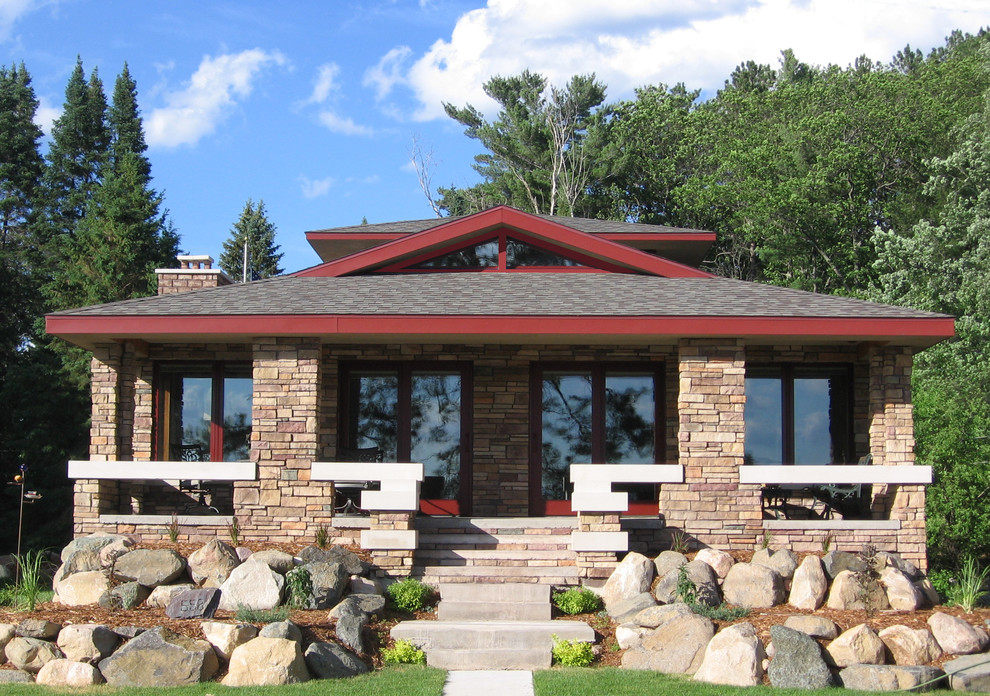Inspiration for a contemporary bungalow house exterior in Minneapolis with a hip roof.