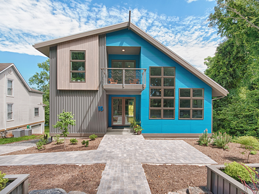 Ejemplo de fachada de casa azul contemporánea de dos plantas con tejado de un solo tendido