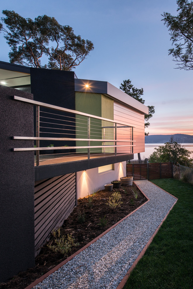 Photo of a contemporary two floor house exterior in Hobart with mixed cladding.