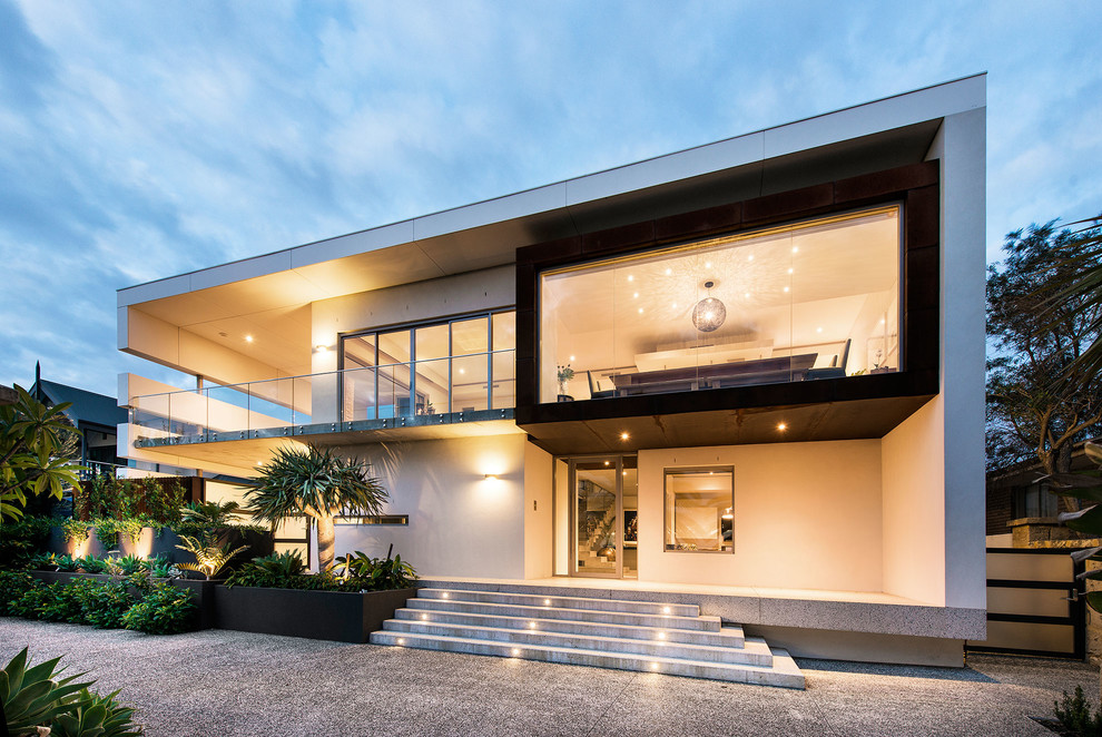 Large and yellow contemporary two floor concrete house exterior in Perth.