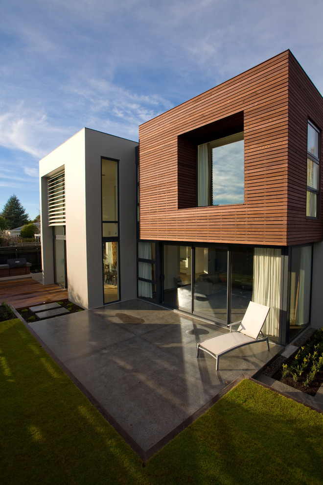 Zweistöckiges, Mittelgroßes Modernes Haus mit Betonfassade in Christchurch