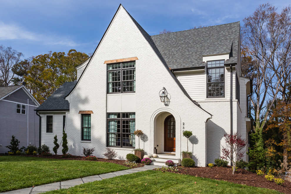 Claremont Midcentury Exterior Raleigh by Frazier Home Design