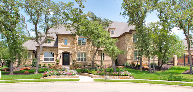 Huge elegant exterior home photo in Dallas