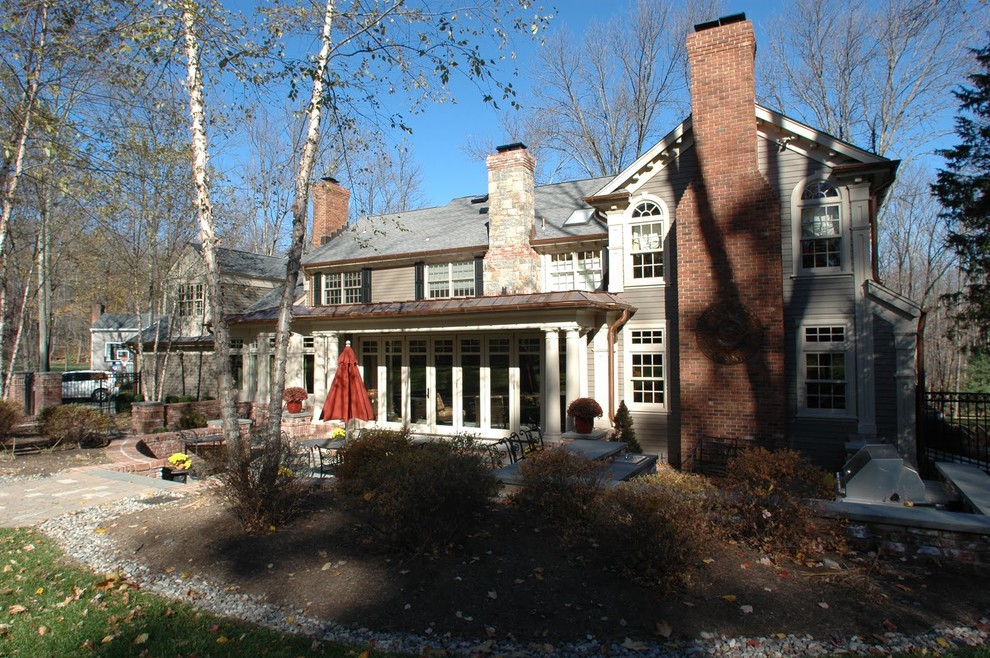 Large elegant gray two-story mixed siding exterior home photo in New York