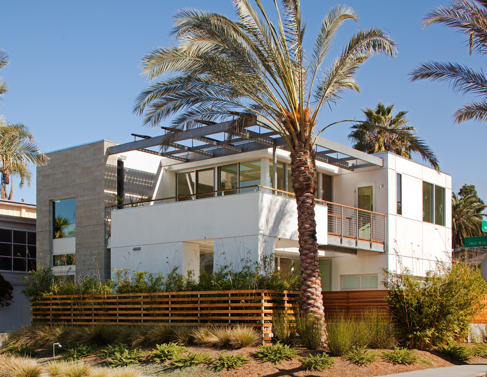 Inspiration for a white contemporary two floor house exterior in San Diego.