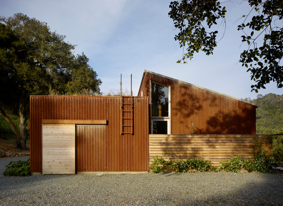 Inspiration for a red metal exterior home remodel in San Francisco with a shed roof
