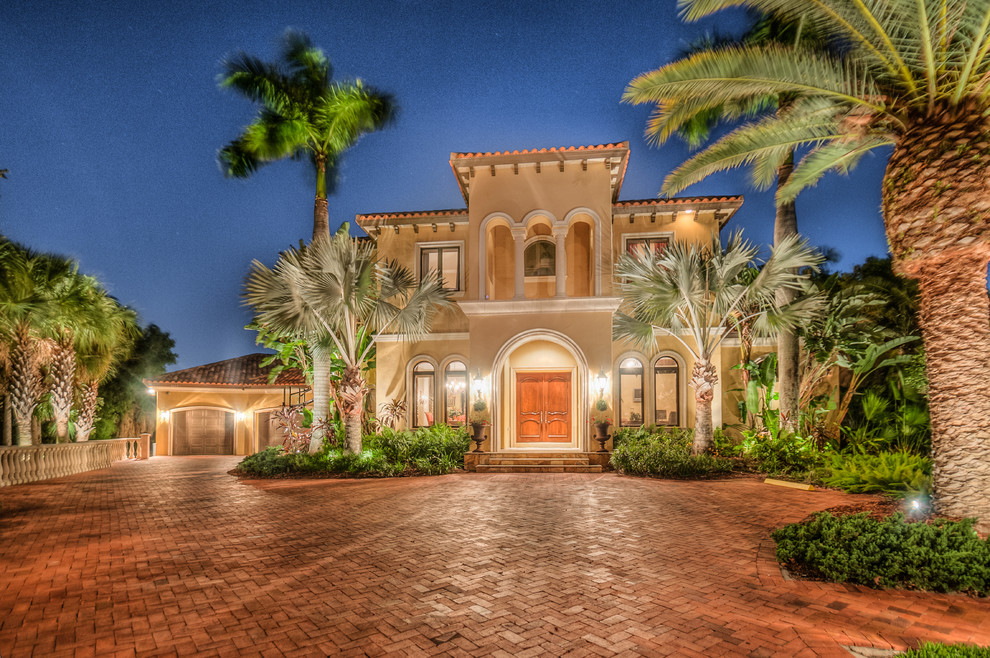 Large and beige two floor house exterior in Tampa.
