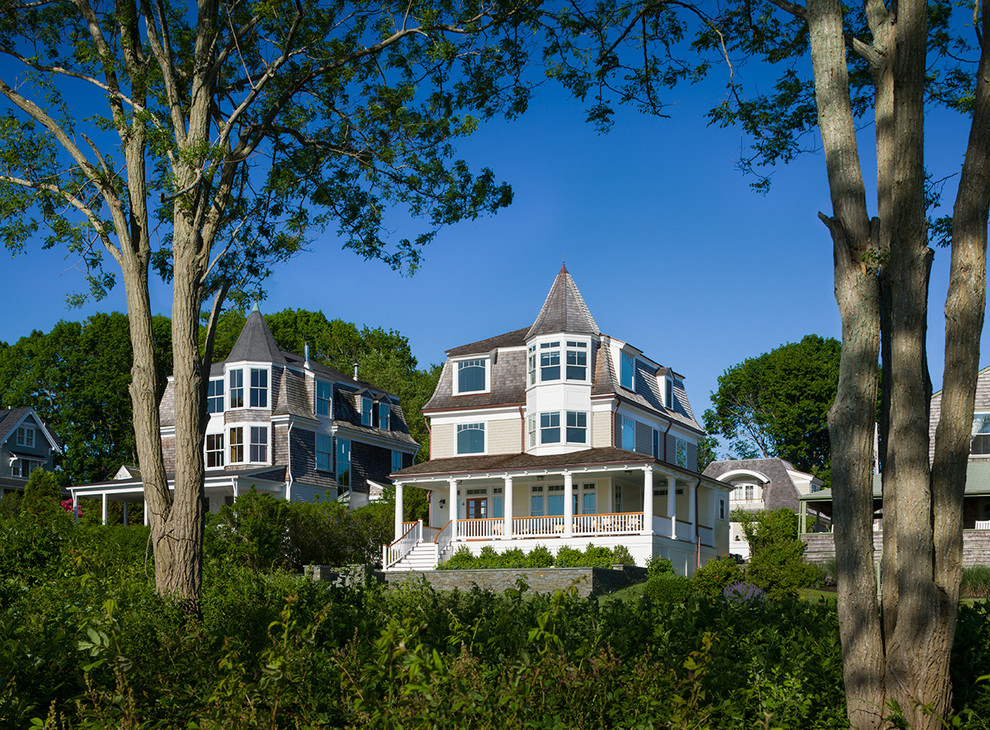 This is an example of a victorian house exterior in Providence with three floors.