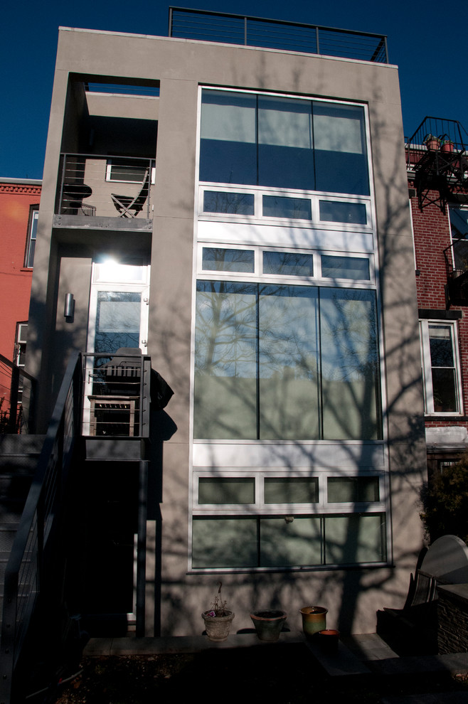 Design ideas for a contemporary house exterior in New York.
