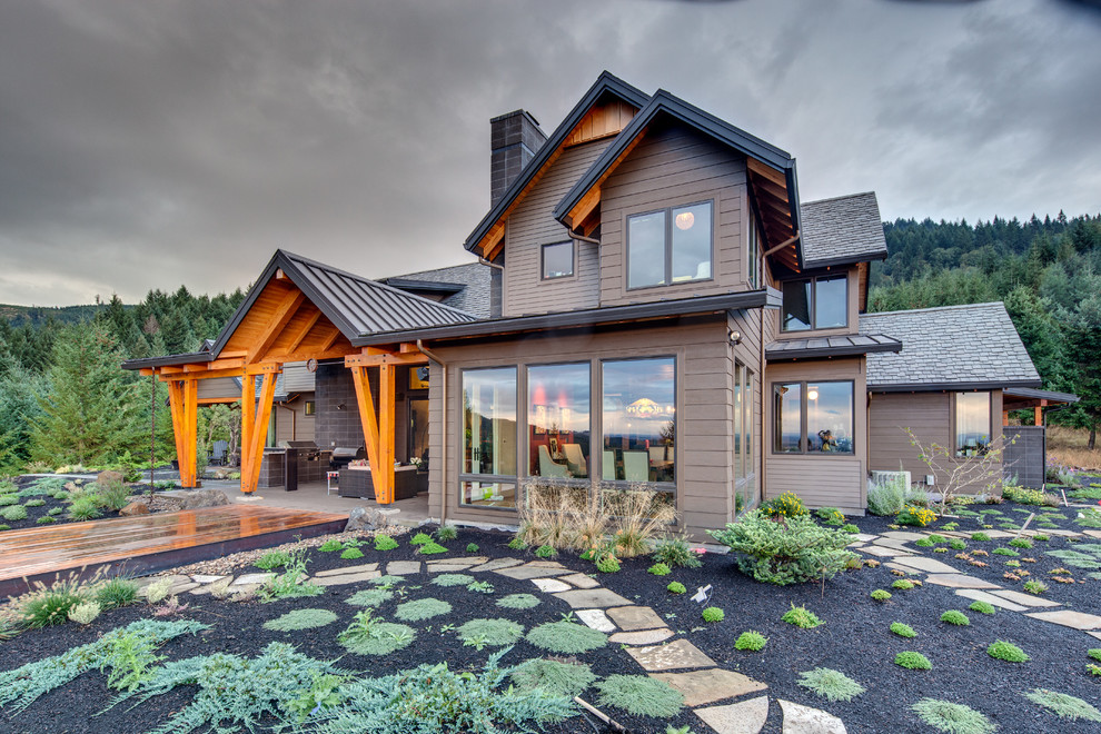 Large transitional gray two-story mixed siding exterior home idea in Other with a shingle roof