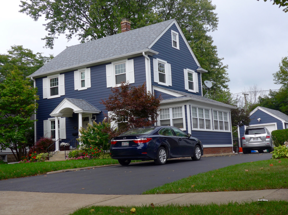 Mid-sized traditional blue two-story concrete fiberboard exterior home idea in Other with a shingle roof