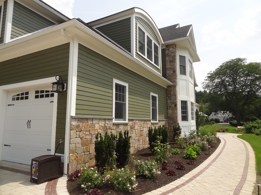 Combining Colonial Tan Natural Stone with Olive Green Siding
